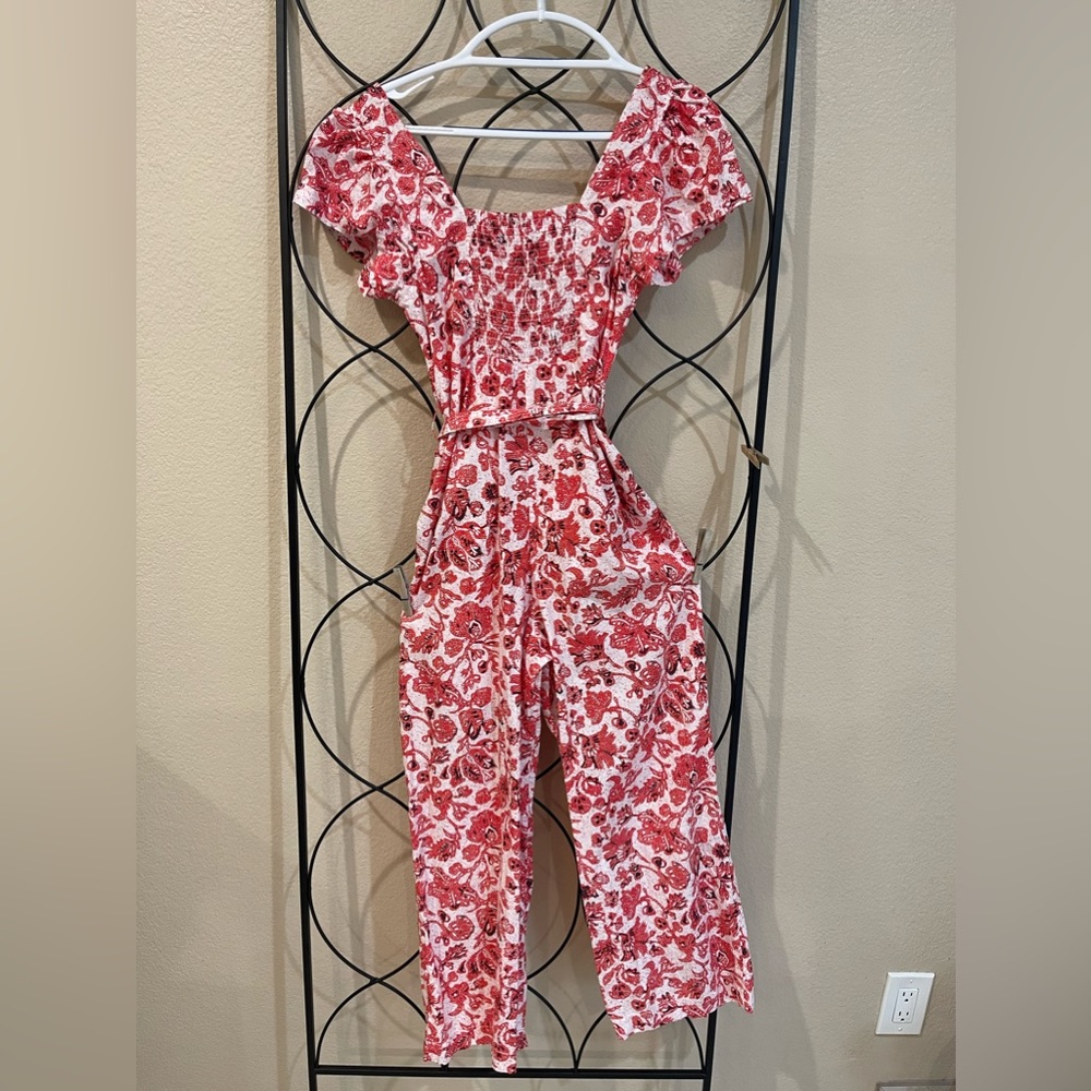 Red & white Find Me Now jumpsuit w/pockets. Size XS.